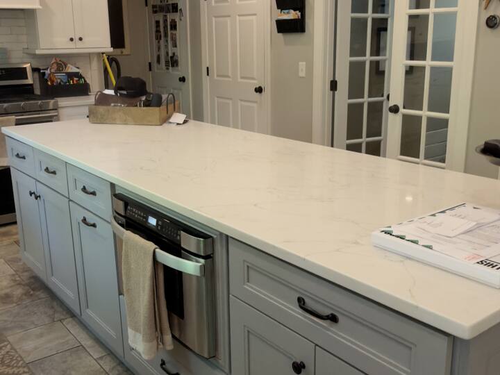 Kitchen island and quartz counter cleaned by AJ Premium Cleaners