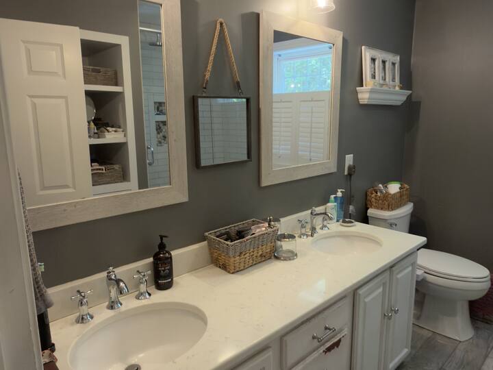 Bathroom with double vanity finished by AJ Premium Cleaners