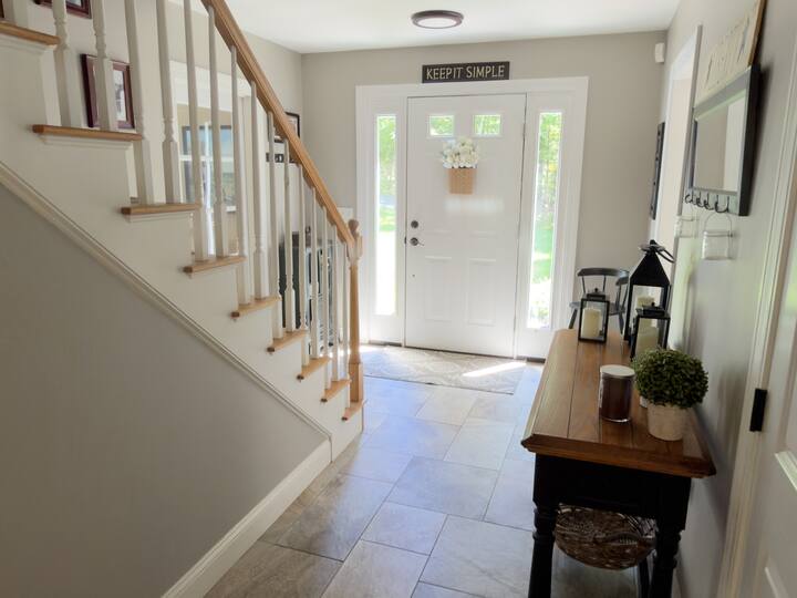 Entryway and staircase cleaned by AJ Premium Cleaners