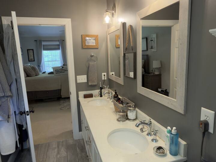 Bathroom vanity and mirror finished by AJ Premium Cleaners